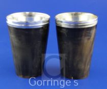A pair of George III silver mounted horn beakers, of tapering cylindrical form, with reeded rims and