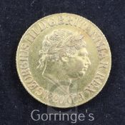 A George III gold sovereign, 1820 near EF