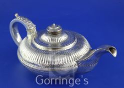 A George IV provincial silver teapot by Barber, Cattle & North, of squat circular form, with