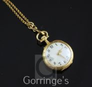 A late 19th century French gold fob watch and a French 18ct gold guard chain, the watch with