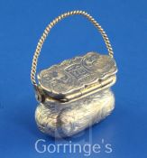 A Victorian silver novelty vinaigrette modelled as a handbag, with rope twist handle, engraved