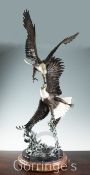 Frank Divita (b.1949) "The Challenge". A cold painted bronze group of bald eagles, signed and