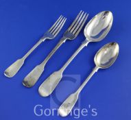A Victorian matched part suite of silver fiddle pattern flatware, with engraved armorial, comprising