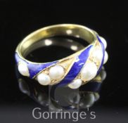 A 19th century gold, blue enamel and split pearl mourning ring, with spiral decoration and set