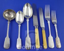 A part suite of late Victorian silver fiddle pattern flatware by Goldsmiths & Silversmiths Co Ltd,