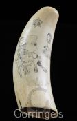 A scrimshaw whale's tooth, decorated with a pipe smoker reading a paper and three young ladies,