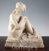 A 19th century Italian alabaster figure of 'The Bather', on integral rectangular plinth, 14in.