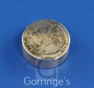 A George III silver circular vinaigrette, engraved with a cherub holding a mirror, and with a