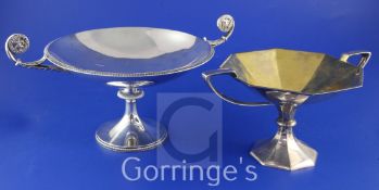 Two George V silver two handled comports, one of octagonal form, the other with lion mask flying