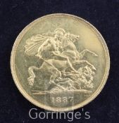 A Victoria Jubilee gold five pounds, 1887, indentation on edge 11 o'clock otherwise EF or better,