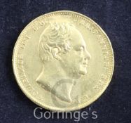 A William IV gold two pounds, 1831, milled edge, die axis at angle, possibly a trial piece,