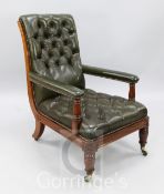 A Victorian mahogany armchair, with buttoned green leather upholstery, H.3ft 4in.
