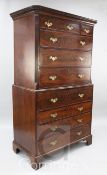 A George III mahogany secretaire chest on chest, with dentil cornice over three short and three