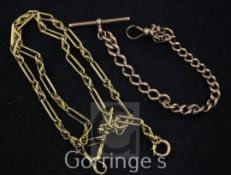 An Edwardian 15ct gold Albert and a similar 9ct gold curb link Albert, 10in & 7in respectively.