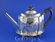A George III silver teapot by Crispin Fuller and a similar stand by Edward Capper?, the teapot of