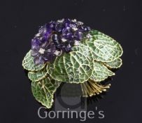 An 18ct gold, amethyst and diamond set plique a jour flower brooch, with plique a jour leaves and