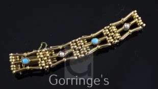 An Edwardian 9ct gold, split pearl and turquoise set gatelink bracelet, with safety chain, gross