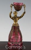 A German ruby glass and gilt metal figural marriage cup, probably Fritz Heckert, late 19th