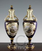 A pair of large Coalport oviform pedestal vases and covers, signed by Percy Simpson, c.1910-14,