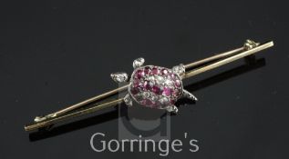 A late Victorian gold and silver, ruby and rose cut diamond set turtle bar brooch, 2.25in.