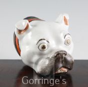A Staffordshire porcelain bulldog's head table snuff box, c.1860, with enamelled details including