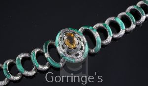 An early 20th century Scottish? silver, citrine and malachite bracelet, with graduated silver oval
