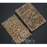 Two Chinese sandalwood card cases, 19th century, each carved in high relief with figures amid