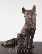 An Austrian cold painted bronze model of a seated fox, 5.25in.