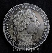 A George III silver crown, 1818, near EF, toned
