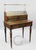 A Regency rosewood, brass marquetry, banded and mounted chevret table, attributed to John McLean,