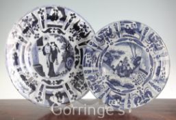 Two Dutch Delft blue and white chargers, c.1690-1700, each painted with Chinese figures to the
