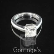 A platinum and solitaire diamond ring, the radiant cut stone weighing approximately 2.30ct, with