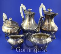 A late Victorian and Edwardian silver five piece tea and coffee service by James Dixon & Sons, of