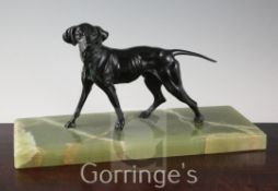 A 1920's bronze model of a hound, on green onyx plinth, width 15.5in.