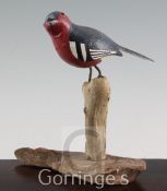 § Guy Taplin (1939-)painted wood,Chaffinch perched on a stump,signed and dated 2000,height 9in.