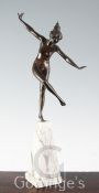 An Art Deco bronze figure of a nude dancing girl, on marble plinth, height 19in.