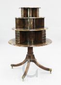 A George III mahogany revolving bookcase, c.1810, with circular graduated three tier top, with