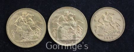 Two Victoria gold sovereigns, 1884 and 1892, and a Victoria gold half sovereign, 1897, VF or