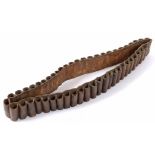 ANGLO-ZULU WAR 1879 - A NATIVE OR UNIT MADE LEATHER CARTRIDGE BANDOLIER  of stitched construction,