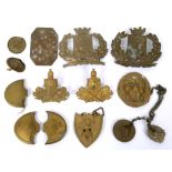 19TH CENTURY - A COLLECTION OF FRENCH BRASS INSIGNIA AND ACCOUTREMENTS  many of stamped construction