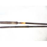 19TH CENTURY - TWO INDONESIAN - JAVANESE TOMBAK SPEARS  with steel blades one watered and long
