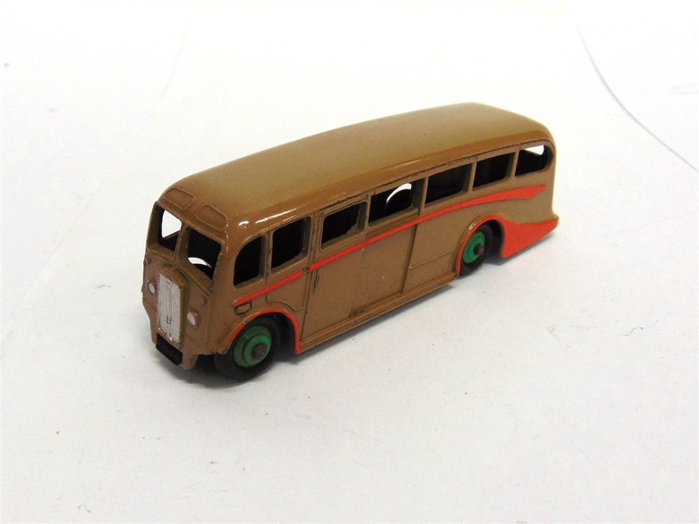 A DINKY NO.281, LUXURY COACH fawn with orange side flashes and mid green ridged hubs, excellent