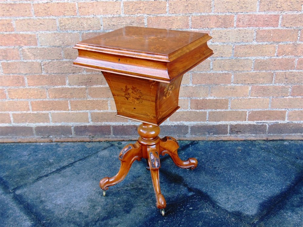 A VICTORIAN MARQUETRY INLAID WALNUT WORK TABLE,  the lid opening to silk lined and fitted