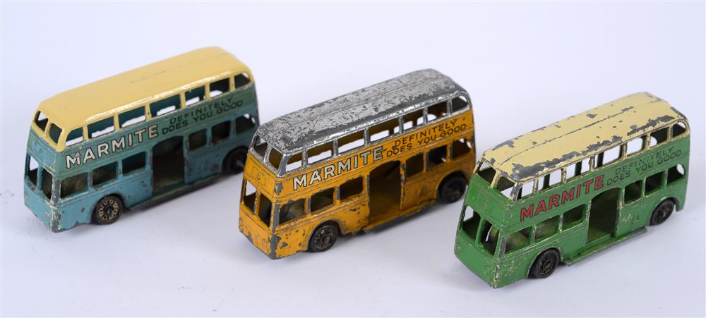 THREE PRE-WAR DINKY BUSES comprising a Dinky No.29a, Motor Bus, yellow with a silver roof, 'Marmite'