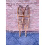 A PAIR OF VINTAGE TUBBS SNOWSHOES the wooden frames stamped 'Vermont / Tubbs' and '10X56-S4',