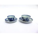 TWO NANKING CARGO TEA BOWLS AND SAUCERS, each typically decoarted with coastal landscape scenes