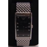 EMPORO ARMANI -A GENTLEMANS BRACELET WATCH the rectangular black dial with diamond dot batons,