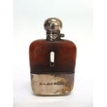 A HIP FLASK half leather covered and with plated mounts by James Dixon & Sons and engraved name 'M.