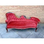 A VICTORIAN CARVED MAHOGANY BUTTON UPHOLSTERED CHAISE LONGUE on cabriole supports, 193cm long 88cm