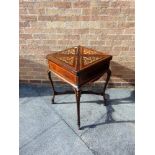 AN EDWARDIAN ENVELOPE TOP CARD TABLE with allover marquetry inlaid decoration on cabriole supports